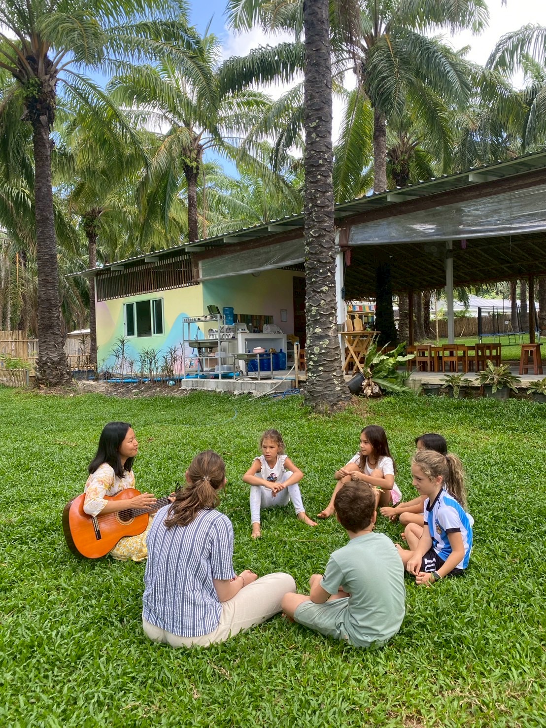 Music circle under palm trees